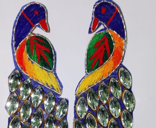 Peacock with stone