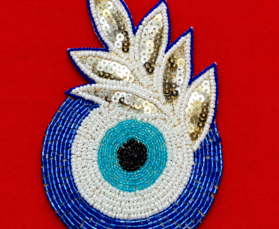 E vil eye with leaf
